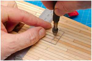 Plexiglasschablone zum Bohren der Dübellöcher