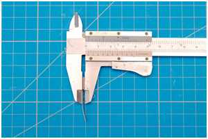 Messen der Stärke der Kalfaterungspappe