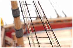 Wanten mit Skala-Garn