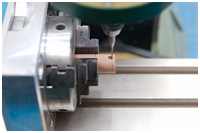 Fräsen der Vierkantlöcher in die Trommel für die Spake