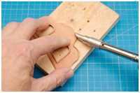 Anpassen des Kranzes am Oberspiegel