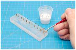 Leine in Kleber tränken