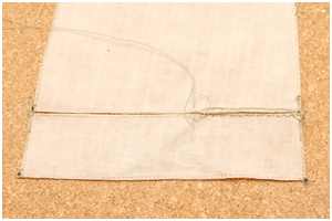 zurück durch die Löcher vom Segel zum Bonnet