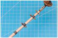 Blockpaare an Rundhölzern