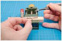 Blockpaare an Rundhölzern