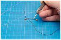 Blockpaare an Rundhölzern